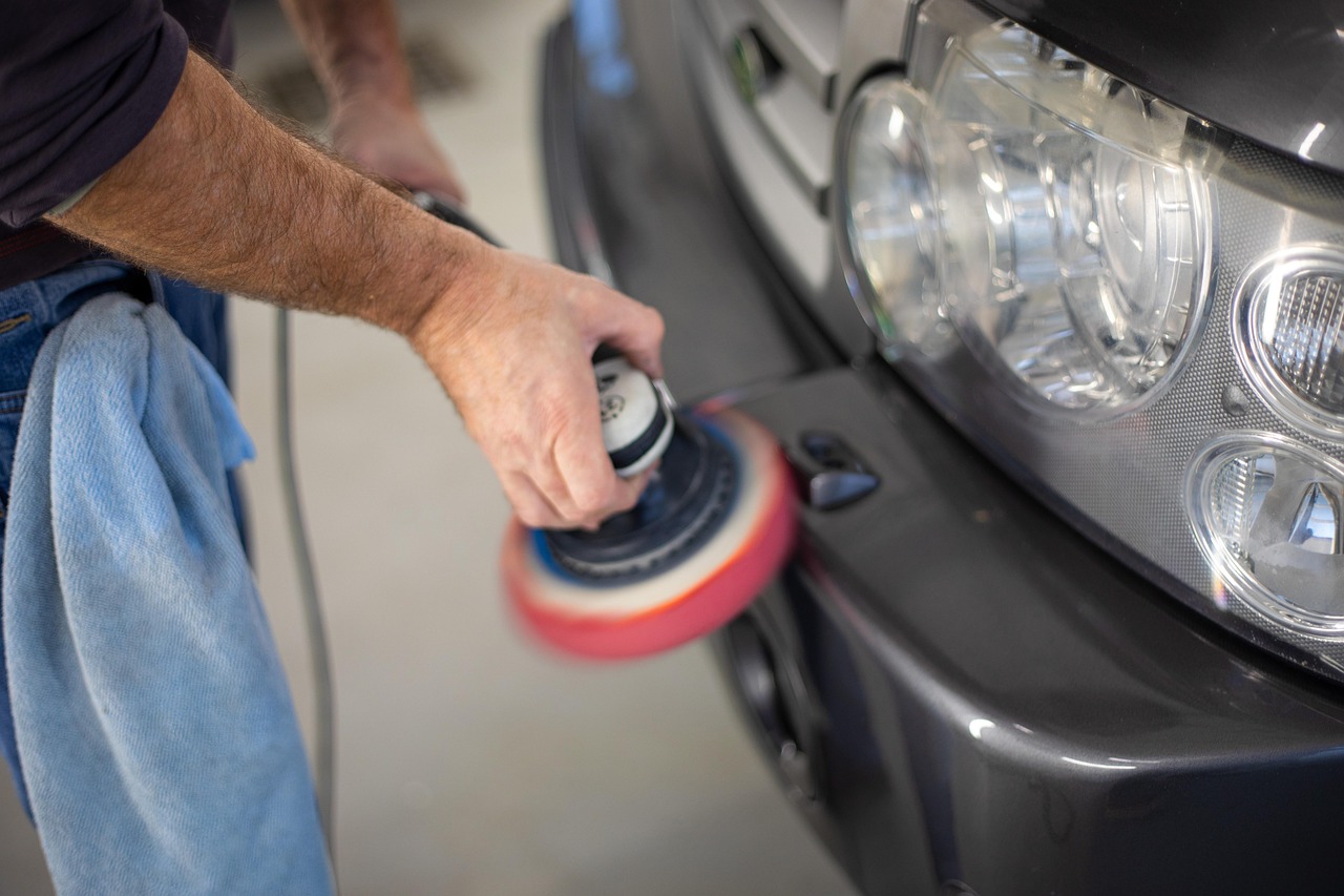 Vehicle being polished during a detailing job